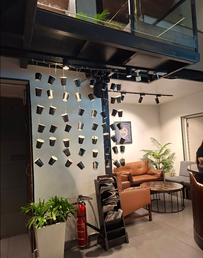 Hanging paper cup installation inside HeeBee